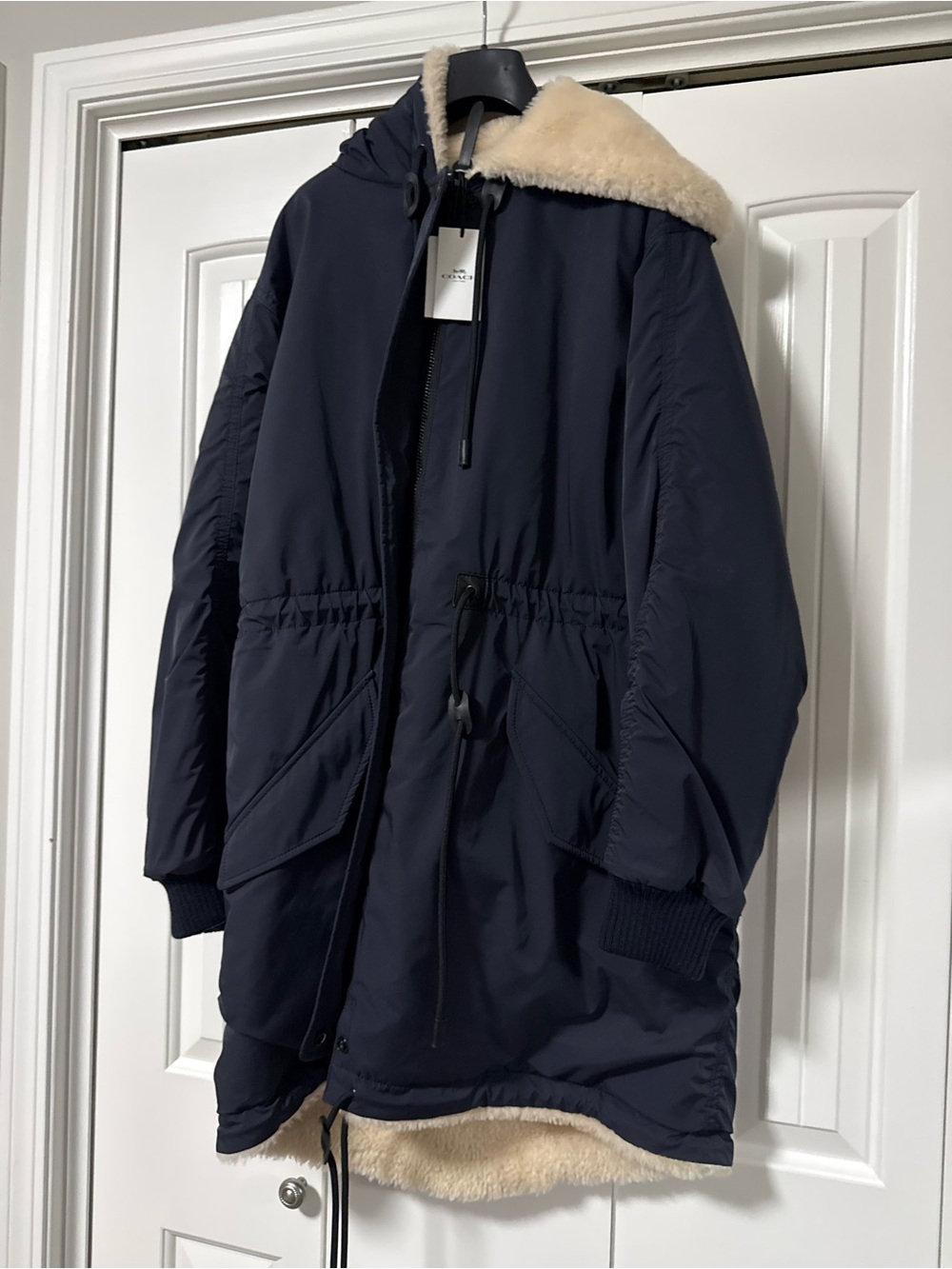 Coach Navy reversible shearling Puffer Parka with Cream Shearling inside. NWT